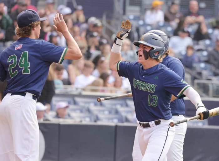 La Costa Canyon's Kalen Applefield celebrates scoring a run during last year's win over Carlsbad at Petco Park